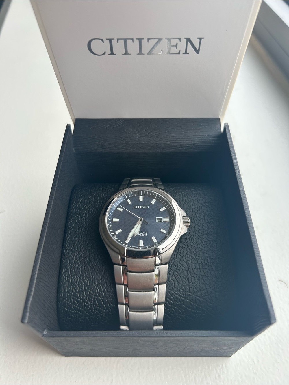Citizen Paradigm Super Titanium Watch with Blue Dial & Stainless Bracelet